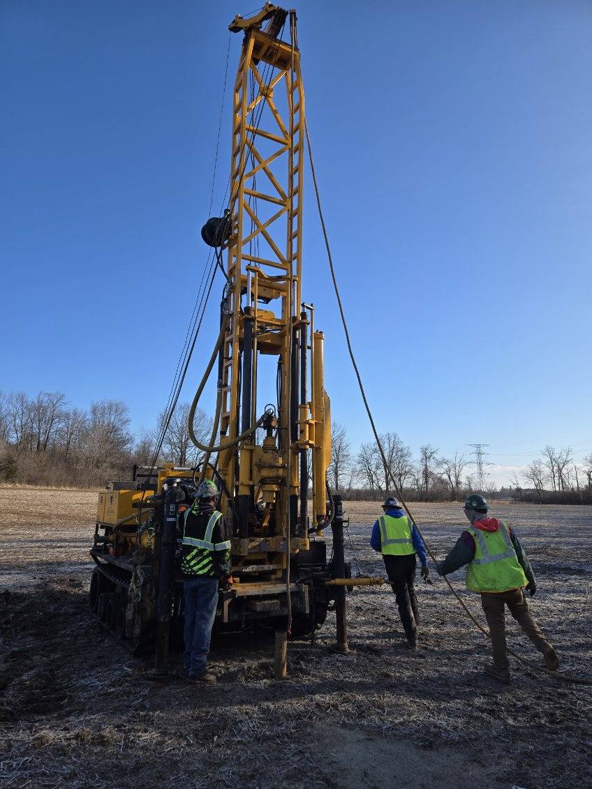 Drilling in a field Drilling in a field